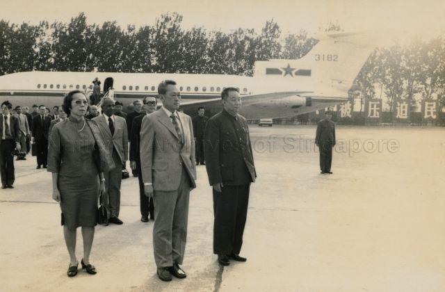 Prime Minister (PM) and Mrs Lee Kuan Yew with Chinese Premier  Hua Guofeng on the tarmac of Peking International Airport. A Singapore goodwill mission led by PM Lee arrived in Peking (Beijing) for a 14-day tour of China.