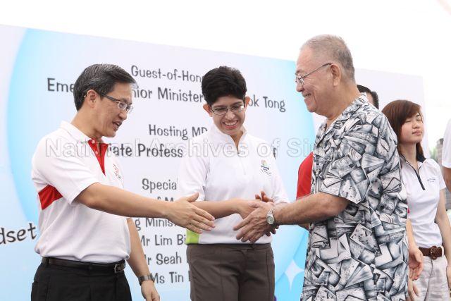 Mountbatten Member of Parliament Lim Biow Chuan (first from left), Marine Parade Group Representative Constituency (GRC) Members of Parliament Fatimah Lateef (second from left) and Ting Pei Ling (first from right) at Geylang Serai Town Carnival at Block 10, Eunos Crescent. Emeritus Senior Minister Goh Chok Tong is guest of honour for this event.