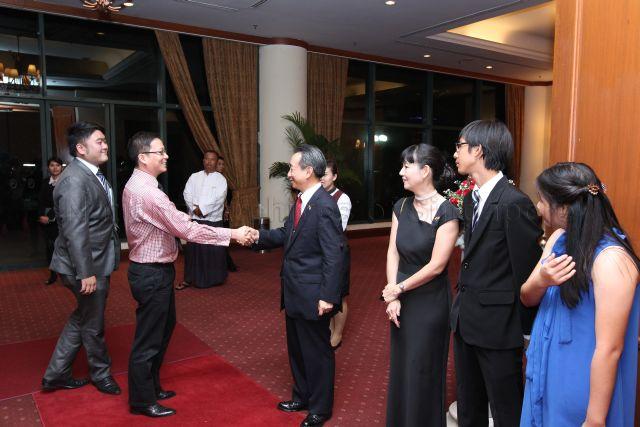 Ambassador Mr Robert Chua and family (on right) welcoming guests