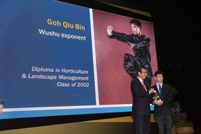 Ngee Ann Polytechnic (NP) alumnus and wushu exponent Goh Qiu Bin receiving alumni award at NP 50th Anniversary Celebration Dinner at NP Convention Centre