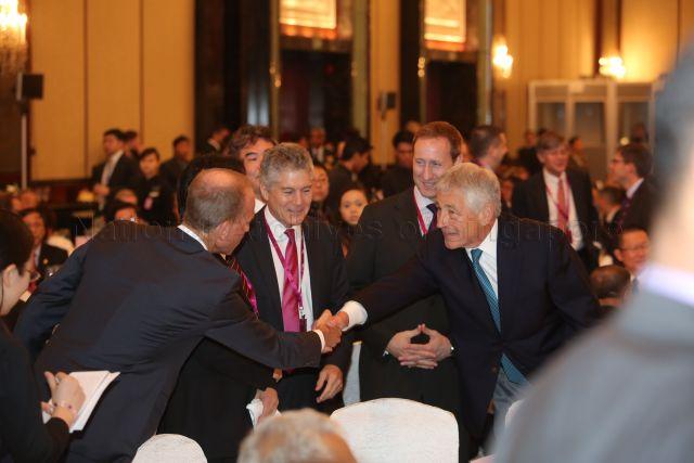 Boeing president and CEO of Boeing defence Dennis A. Muilenburg shaking hands with U.S. Secretary of Defence Chuck Hagel at Shangri-La Dialogue opening dinner at Island Ballroom, Shangri-La Hotel