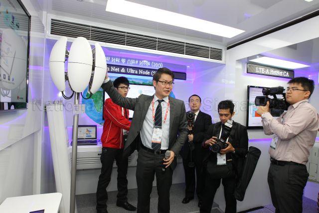 Exhibitors at Infocomm Media Business Exchange (IMBX) exhibition at Marina Bay Sands Convention Centre