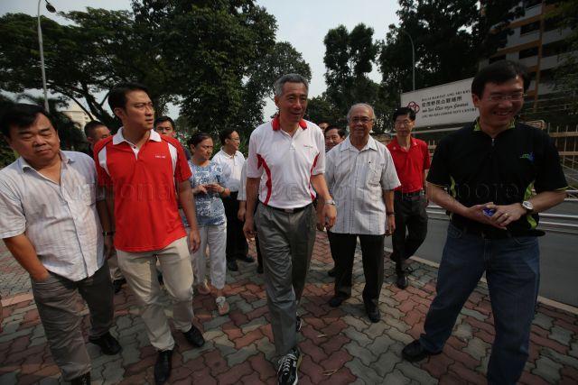 Prime Minister Lee Hsien Loong, (2nd from left) Member of Parliament (Sengkang West) Dr Lam Pin Min, (2nd and 3rd from right) Chief Executive Director of People's Association Ang Hak Seng and former Member of Parliament and Ang Mo Kio GRC Grassroots Advisor Assoc Professor Sushilan Vasoo, attending Ang Mo Kio Residents and Town Hall Meeting of Committee Club Management Committee (CCMC) at Teck Ghee Town Hall, Blk 220, Ang Mo Kio Ave 1.