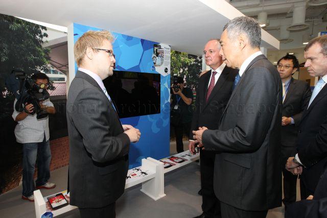 Taken at: Opening Ceremony of Four Acres Singapore, Unilever's Global Leadership Centre. Held at Multipurpose Hall of Four Acres Singapore, 18 Nepal Park<br />Pictured: Prime Minister Lee Hsien Loong and (in red tie) CEO of Unilever Paul Polman