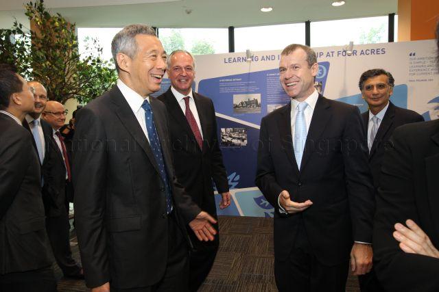 Taken at: Opening Ceremony of Four Acres Singapore, Unilever's Global Leadership Centre. Held at Multipurpose Hall of Four Acres Singapore, 18 Nepal Park<br />Pictured: Prime Minister Lee Hsien Loong and (in red tie) CEO of Unilever Paul Polman
