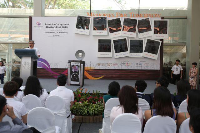 National Heritage Board Chairman, Ong Yew Huat (wearing white polo shirt) speaking on stage during launch of Singapore Heritage Fest 2013 held at the National Museum of Singapore