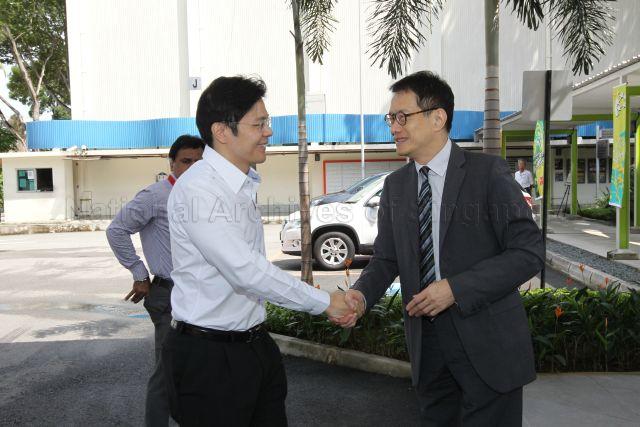 National Arts Council Chairman Edmund Cheng Wai Wing (right) welcoming the arrival of Acting Minister for Culture, Community and Youth and Senior Minister of State for Ministry of Communications and Information Lawrence Wong (left) to the Goodman Arts Centre.