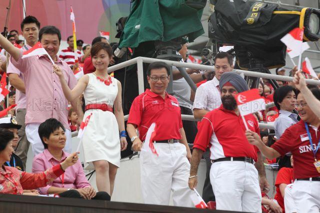 Potong Pasir Single Member Constituency Member of Parliament Sitoh Yih Pin (fifth from right), Marine Parade Group Representation Constituency Member of Parliament Tin Pei Ling (fourth from right), Tampines Group Representation Constituency Member of Parliament Mah Bow Tan (third from right) and Ang Mo Kio Group Representation Constituency Member of Parliament Inderjit Singh (second from right) are attending National Day Parade 2013 at the Float @ Marina Bay.