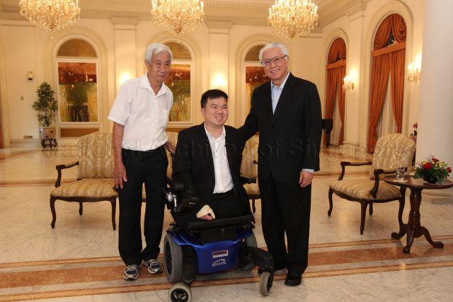 President Tony Tan (3rd from left) is posing for a photo