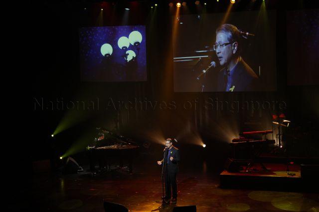Justice Lee Seiu Kin performing at the Singapore Academy of Law Charity Concert. The concert is held at School of the Arts, Drama Theatre.