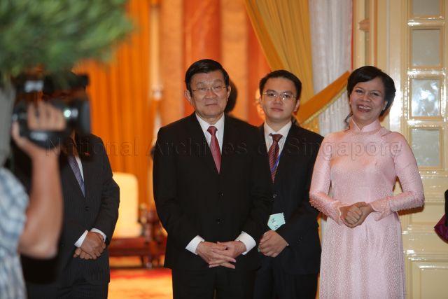 Vietnam President Truong Tan Sang and his wife Mai Thi Hanh (3rd and 5th from left) waiting for the arrival of Prime Minister Lee Hsien Loong at the Presidential Palace in Hanoi, Vietnam.