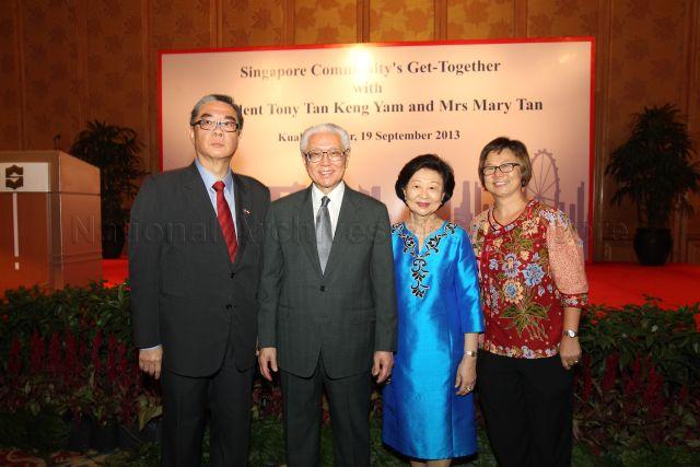 (From left) Singapore High Commissioner to Malaysia Ong Keng Yong, President Tony Tan and his wife Mary Tan and Irene Tan Lee Chen, wife of Singapore High Commissioner to Malaysia, at a reception for the Singapore community during President Tan's three-day official visit to Malaysia. This event is held at Sabah ballroom, Shangri-La Hotel in Kuala Lumpur.