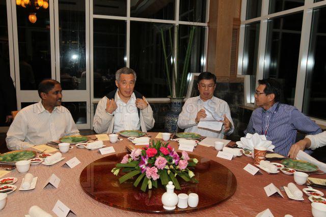 Taken at: Arrival in Brunei International Airport for the 23rd ASEAN Summit and Related Summits followed by delegation dinner at Li Gong restaurant in Empire Hotel during Prime Minister Lee Hsien Loong’s visit to Brunei Darussalam from 9 to 10 October 2013 Pictured: Prime Minister Lee Hsien Loong