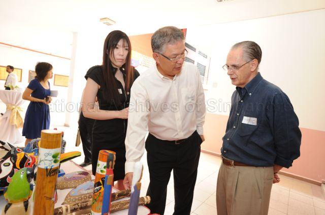 Chairman of Cairnhill Community Club Management Committee (CCMC) Low Hien Kiah and Venezuelan Ambassador Alfredo Toro Hardy at Venezuela Friendship Day, an event held at Cairnhill CC jointly organised by Embassy of Venezuela and the Professionals, Managers, Executives and Technicians (PMET) Division of Peopleâ€™s Association