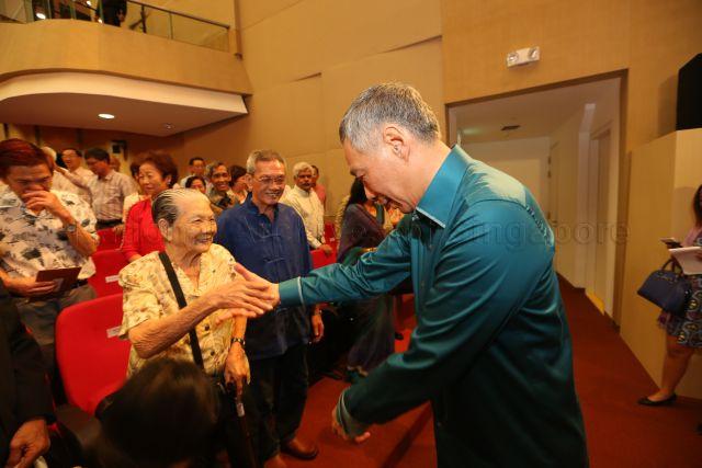 Prime Minister Lee Hsien Loong greeting Madam Wong Ah Woon, one of Pioneer Generation seniors, during National Day Rally at the auditorium, Institute of Technical Education (ITE) headquarters and College Central in Ang Mo Kio