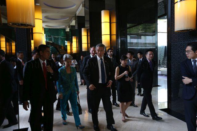 Taken at: Indonesians celebrating the inauguration of their 7th President Joko Widodo and 12th Vice-President Jusuf Kalla in Jakarta Pictured: Prime Minister Lee Hsien Loong, his wife Madam Ho Ching and Principal Private Secretary to the Prime Minister Chng Kai Fong