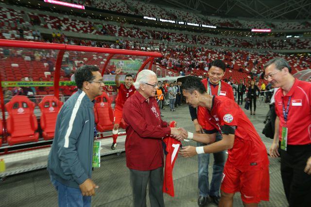 Taken at: ASEAN Football Federation (AFF) Suzuki Cup soccer match (Singapore vs Myanmar) at the National Stadium Sports Hub Pictured: President Tony Tan, Minister of State for Culture, Community and Youth Sam Tan, President of Football Association of Singapore (FAS) Zainudin Nordin and General Secretary of Football Association of Singapore (FAS) Winston Lee