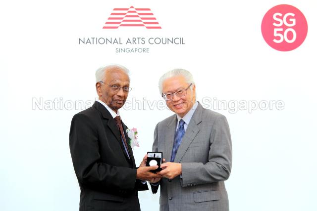 President of Singapore Tony Tan Keng Yam presenting the Cultural Medallion to KTM Iqbal at the 2014 Cultural Medallion and Young Artist Award presentation ceremony