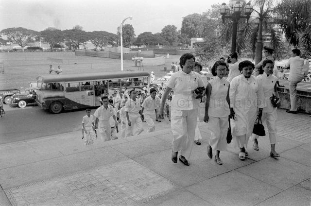 Female members of People's Action Party (PAP) making their way to attend the swearing-in of the Legislative Assembly at City Hall. The full list of the female PAP members were (from right) Hoe Puay Choo, Sahorah Binte Ahmat and Chan Choy Siong and Oh Su Chen. However, only the first three were sworn in as assembly members.