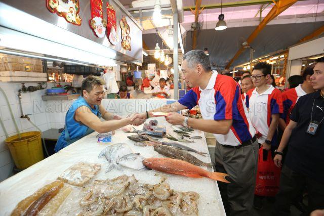 Taken at: Teck Ghee Hongbao Presentation event cum Market visit at Ang Mo Kio, Blk 409 and Blk 341<br />Pictured: Prime Minister Lee Hsien Loong