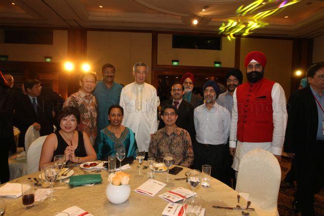 Taken at: Sikh Community Dinner 2015, 25th Anniversary of the Singapore Sikh Education Foundation (SSEF) and launch of Young Sikh Association's (YSA) book 'Singapore at 50 - 50 Sikhs and Their Contributions' at Raffles Town Club Pictured: Guest-of-Honour Prime Minister Lee Hsien Loong, Chairman of the Panel of Reviewers for YSA book 'Singapore at 50 - 50 Sikhs and Their Contributions' and Yale-NUS College Executive Vice-President (Academic Affairs) and former Nominated MP Prof Tan Tai Yong, members of the Panel of Reviewers for YSA book 'Singapore at 50 - 50 Sikhs and Their Contributions' Presidental Council for Religious Harmony and Minority Rights member and Justice of the Peace Surjit Singh s/o Wazir Singh, Singapore Indian Education Trust Management Committee member and Singapore Institute of Technology Director of Academic Analysis and Planning and former Singapore Indian Development Association (SINDA) CEO T Raja Segar, National Library Board (NLB) Chief Organisational Excellence Assessor/Quality Service Management and member of the Sikh Advisory Board Dr Narinder Kaur, Solstar International Quality Control Engineer and former Sikh Sewaks President Navin Pal Singh