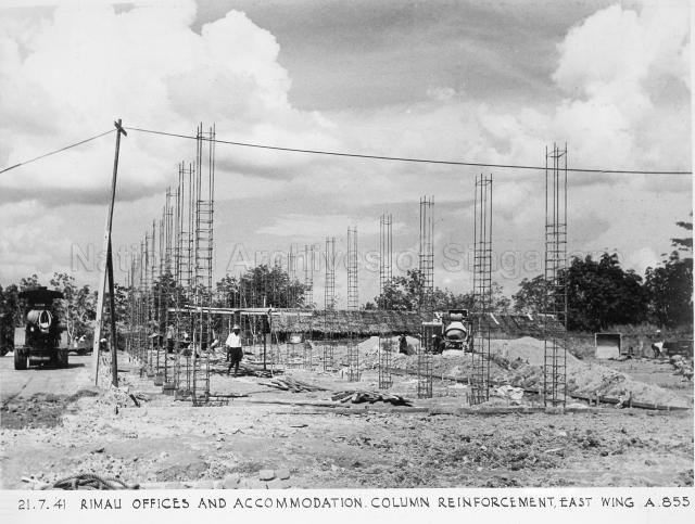 Singapore Naval Base - Rimau offices and accommodation. Column reinforcement East Wing. The photograph shows Rimau Offices under construction. Rimau Offices would be used as the Rimau Naval Base Police Asian Barracks from the late 1950s until 1971, when the force was disbanded with the withdrawal of British Forces from Singapore  (although families were permitted to live there until early 1972). The complex would be put to use as a branch of Woodbridge Hospital (now IMH), View Road Hospital from 1975 to 2001. The branch was used for the rehabilitative care of long term schizophrenic patients, many of whom were able to work on the premises or in the factories in the area in the day time. It was also used as a foreign workers dormitory on two occasions and is currently unoccupied. The area is slated for redevelopment as part of the Woodlands North development.