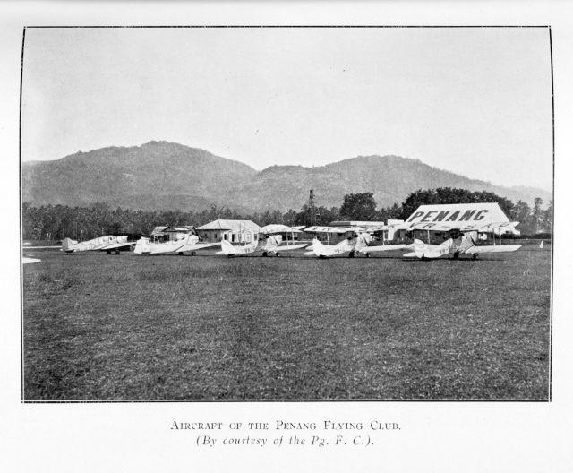 Five aircraft of the Penang Flying Club lined up in a row on the field. (By courtesy of the Pg. F.C.)