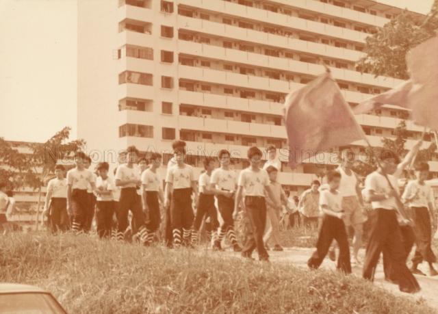 Lion Dance troop Singapore Siau Tiong San Athletic Association (新加坡少忠山国术体育会 ) returning from a street procession.