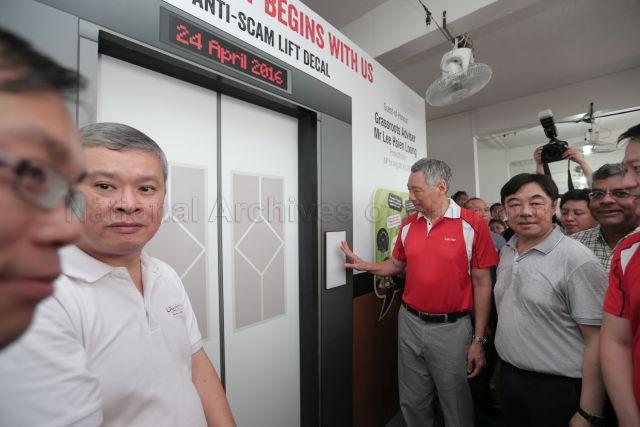 Taken at: Safer Roads @ AMK Begin With Me! behind Blk 533 Ang Mo Kio Avenue 5 Pictured: Guest-of-Honour and Grassroots Adviser Prime Minister Lee Hsien Loong, Senior Minister of State for Ministry of Health Dr Lam Pin Min (partially hidden) and Member of Parliament for Ang Mo Kio GRC Ang Hin Kee