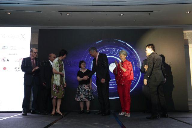 Taken at: The Down Syndrome Association's (DSA) 20th Anniversary Charity Gala Dinner 2016 - Mystique X at the Mandarin Oriental Singapore Pictured: Guest-of-honour Prime Minister Lee Hsien Loong and his wife Madam Ho Ching