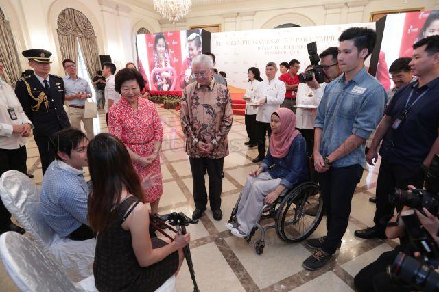 Taken at: President Tony Tan Keng Yam and his wife Mrs Mary Tan hosting a tea reception for Team Singapore's Olympians, Paralympians & officials at the Banquet Hall, Istana Pictured: President Tony Tan Keng Yam, his wife Mrs Mary Tan, Paralympic athlete Norsilawati Sa'at, Paralympic equestrian riders Gemma Foo (back facing camera) and Maximillian Tan (partially hidden) and Olympic badminton player Derek Wong
