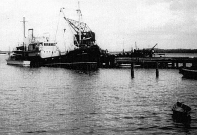 Royal Air Force (RAF) auxiliary 'Aquarius' leaving Weaver Locks, Cheshire, enroute to Devonport to be fitted out for the trip to Seletar