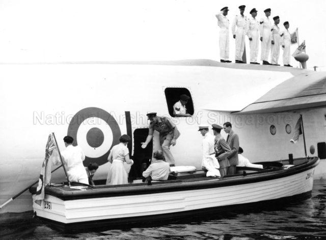 Photograph of Duchess of Kent boarding a Sunderland for a flight to Kuching. Princess Marina: Oct 14 1952.
