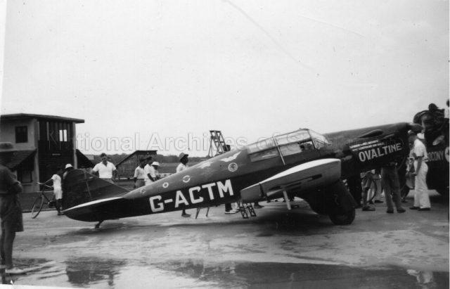 Photograph of an aircraft G-ACTM on a London-Melbourne Centenary Air Race sponsored by Ovaltine.
