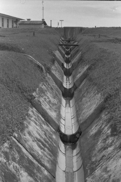 Photograph of a deep monsoon drain.