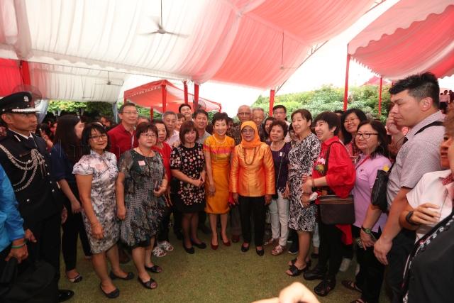 Taken at: Chinese New Year Garden Party at the Istana. Pictured: President Halimah Yacob, her husband Mohamed Abdullah Alhabshee and Minister for Culture, Community and Youth Grace Fu.