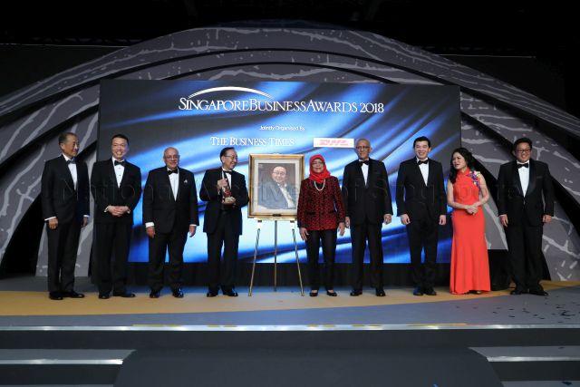 Taken at: Singapore Business Awards (SBA) presentation ceremony and black-tie dinner at the Ritz-Carlton Millennia Singapore &nbsp;Pictured: Guest-of-Honour President Halimah Yacob and her husband Mohamed Abdullah Alhabshee, Board of Director at Temasek Holdings and Member of the Council of Presidential Advisers Stephen Lee, CEO of DHL Express Asia Pacific Ken Lee, CEO of Singapore Press Holdings Ng Yat Chung, SBA Enterprise Award recipient, Executive Director and Chief Legal Officer of HRnetGroup Limited Adeline Sim, SBA Outstanding Overseas Executive of the Year recipient, Chief Executive Officer of ComfortDelGro (UK & Ireland) Jaspal Singh, SBA Businessman of the Year recipient, Executive Chairman of the PhillipCapital Group Lim Hua Min and SBA Outstanding Chief Executive of the Year recipient, Chief Executive Officer of the Changi Airport Group (Singapore) Pte Ltd Lee Seow Hiang