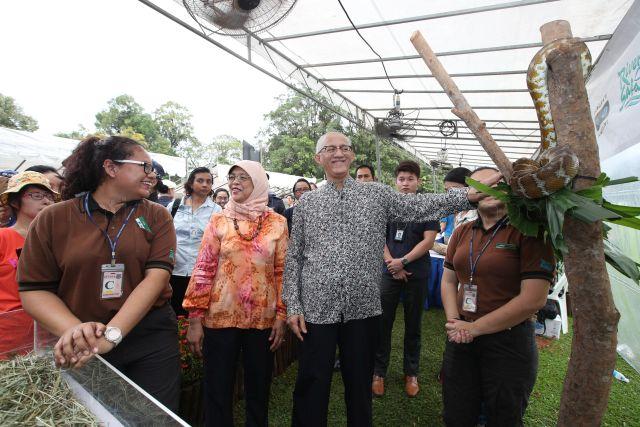 Taken at: President Halimah Yacob and her husband Mohammed Abdullah Alhabshee meet visitors at Open House (Labour Day) at Istana Pictured: President Halimah Yacob and her husband Mohammed Abdullah Alhabshee