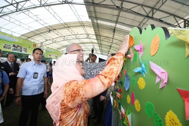 Taken at: President Halimah Yacob and her husband Mohammed Abdullah Alhabshee meet visitors at Open House (Labour Day) at Istana Pictured: President Halimah Yacob and her husband Mohammed Abdullah Alhabshee