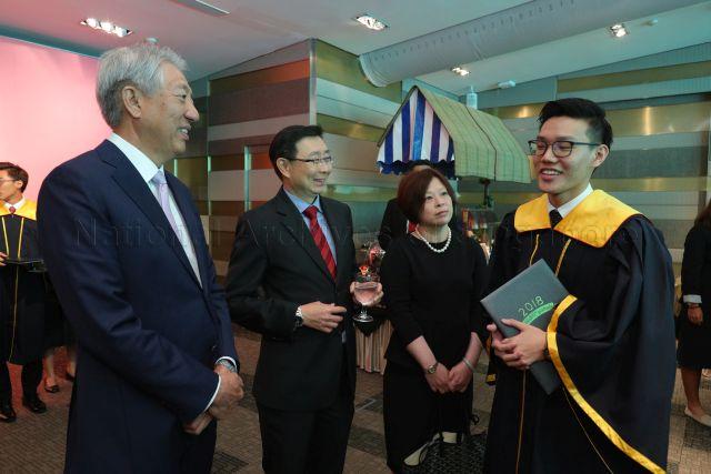 Taken at: Singapore Polytechnic’s (SP) 58th Graduation Ceremony celebrating 200000 graduates &nbsp; Pictured: Guest-of-Honour Deputy Prime Minister and Coordinating Minister for National Security Teo Chee Hean, SP Principal and CEO Mr Soh Wai Wah, Diploma in Perfumery and Cosmetic Science graduate and Chua Chor Teck Gold Medal winner Lim Jing Ying, Diploma in Mechanical Engineering graduate and Tay Eng Soon Gold Medal winner Chiew Kang Lin, Diploma in Electrical and Electronic Engineering graduate and Lee Kuan Yew Award winner Lee Wen Wei, Diploma in Energy Systems and Management graduate and Lee Kuan Yew Award winner Dominic Li Guoming, Diploma in Accountancy graduate and Low Guan Onn Gold Medal winner Tan Yu Yang, Diploma in Creative Writing for TV and New Media graduate and Toh Chin Chye Gold Medal winner Kirstin Yip Su Jun, Diploma in Digital Animation graduate and Tan Kay Yong Gold Medal winner Erica Tan Xi-Wen, Diploma in Marine Engineering graduate and Lee Kuan Yew Award winner Muhammad Khairul Afiq Bin Juma’at