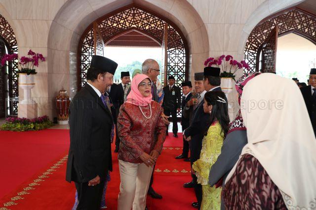 Taken at: State Welcome ceremony at Istana Nurul Iman, during President Halimah Yacob’s State Visit to Negara Brunei Darussalam from 11 to 14 May 2018 Pictured: President Halimah Yacob and her husband Mr Mohammed Abdullah Alhabshee, Sultan and Yang Di-Pertuan of Negara Brunei Darussalam Haji Hassanal Bolkiah Mu’izzaddin Waddaulah, Sarah binti Salleh Ab-Rahaman, wife of Crown Prince of Negara Brunei Darussalam Haji Al-Muhtadee Billah (partially hidden) and Prince Mohamed Bolkiah