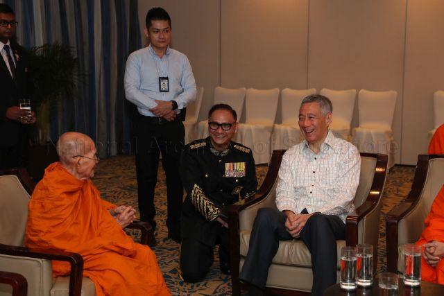 Taken at: Wat Ananda Metyarama Thai Buddhist Temple's 100th Anniversary celebration at Fairmount Hotel &nbsp;Pictured: Prime Minister Lee Hsien Loong and Chief Abbott of Wat Ananda Metyarama Thai Buddhist Temple Venerable Chao Khun Phra Tepsiddhivides