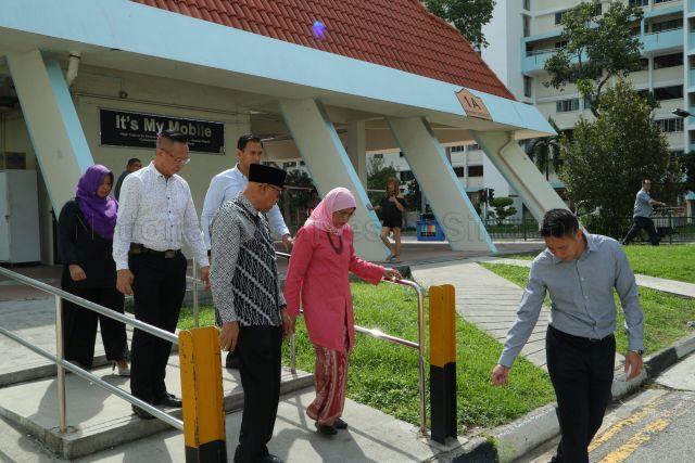 Taken at: Ain Society’s Habuan Aidilfitri Disbursement ceremony at 2 Eunos Crescent &nbsp;Pictured: Guest-of-Honour President Halimah Yacob, Ain Society's President Abdul Malek Bin Osman and Ain Society's Chief Executive Officer Haji Md Yusof Bin Ismail