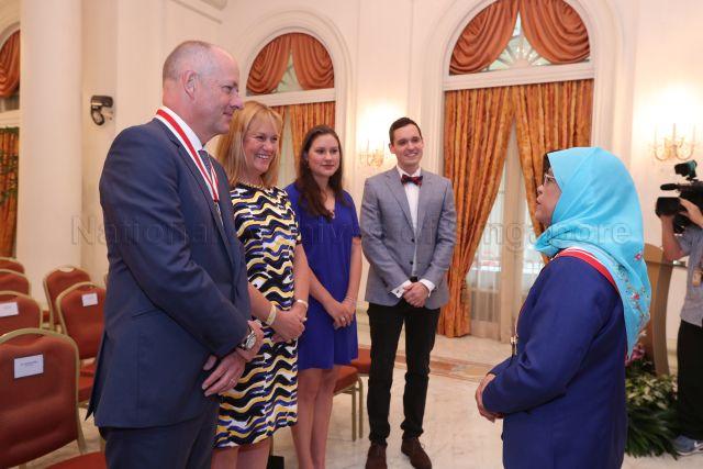 Taken at: Conferment of Honorary Citizen Award to Sir Andrew Philip Witty at the Istana  Pictured: President Halimah Yacob and former Chief Executive Officer of GlaxoSmithKline (GSK) Sir Andrew Witty and his wife Lady Caroline Witty
