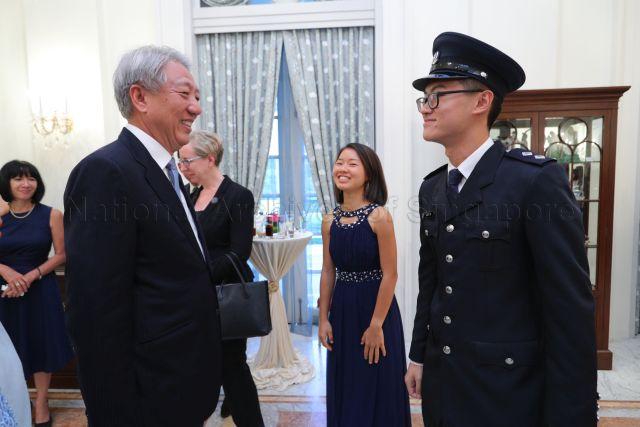 Taken at: President's Scholarship Award ceremony and dinner at the Istana &nbsp;Pictured: Deputy Prime Minister and Coordinating Minister for National Security Teo Chee Hean and President's Scholarship recipients Penny Shi Peng Yi and Alden Tan Ming Yang