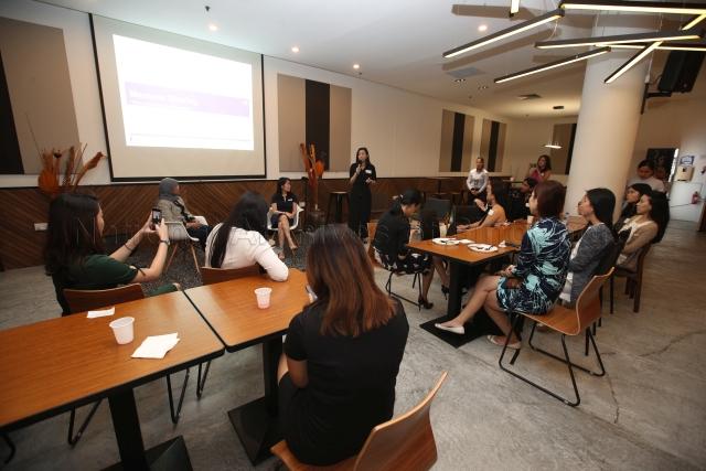 Taken at: Young Women's Leadership Connection (YWLC) session at the Singapore Management University (SMU). Pictured: President Halimah Yacob and YWLC Mentorship Director Goh Xin Ying.
