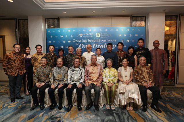Taken at: Singapore General Hospital (SGH) Department of Urology 30th Anniversary Gala Dinner at Shangri-La Hotel  Pictured: Guest-of-Honour Prime Minister Lee Hsien Loong with wife Mdm Ho Ching, Chairman of SingHealth Peter Seah, Group CEO of SingHealth Prof Ivy Ng, Deputy Group CEO (Medical and Clinical Services) of SingHealth Prof Fong Kok Yong, Deputy Group CEO (Organisational Transformation and Informatics) of SingHealth and CEO of SGH Prof Kenneth Kwek, Head and Senior Consultant of SGH Urology Centre Assoc Prof Henry Ho Sun Sien, Emeritus Consultant of SGH Urology Centre Prof Foo Keong Tatt, Senior Consultants of SGH Urology Centre Assoc Prof Chong Tsung Wen, Prof Christopher Cheng Wai Sam, Assoc Prof John SP Yuen, Dr Ng Lay Guat, Adj Assoc Prof Lee Lui Shiong, Dr Nor Azhari Mohd Zam, Consultants of SGH Urology Centre Dr Valerie Gan Huei Li and Dr Tay Kae Jack