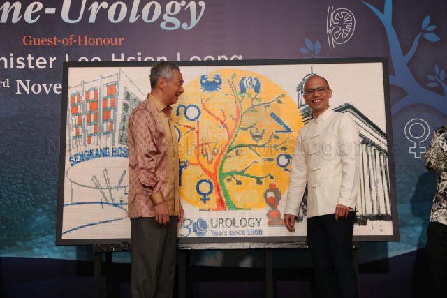 Taken at: Singapore General Hospital (SGH) Department of Urology 30th Anniversary Gala Dinner at Shangri-La Hotel  Pictured: Guest-of-Honour Prime Minister Lee Hsien Loong and Head and Senior Consultant of SGH Urology Centre Assoc Prof Henry Ho Sun Sien
