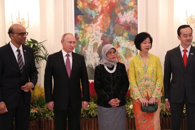 Taken at: State Banquet for Russian President Vladimir Putin hosted by Singapore President Halimah Yacob at Istana. Pictured: Russian President Vladimir Putin, Singapore President Halimah Yacob, Deputy Prime Minister Tharman Shanmugaratnam and Senior Minister of State for Culture, Community and Youth Sim Ann.