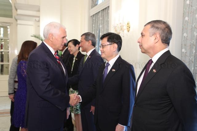Taken at: Official Welcome Ceremony for US Vice-President Mike Pence at Istana. Pictured: US Vice-President Mike Pence, Minister for Defence Dr Ng Eng Hen's wife Dr Ivy Lim Swee Lian (fourth from right), Minister for Foreign Affairs Dr Vivian Balakrishnan (third from right) and Minister for Finance Heng Swee Keat (second from right).